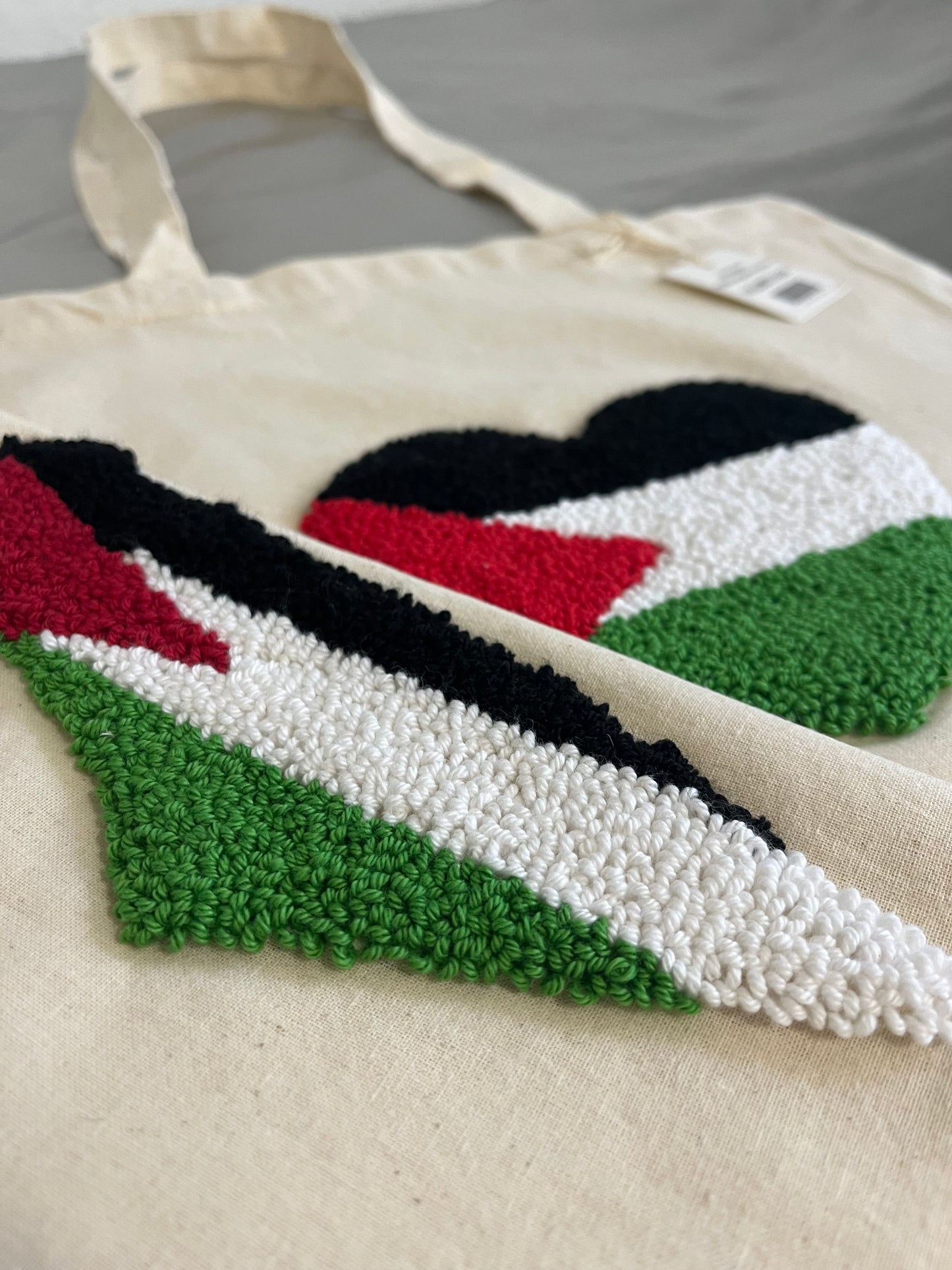 Hand-made punch needle palestine bag