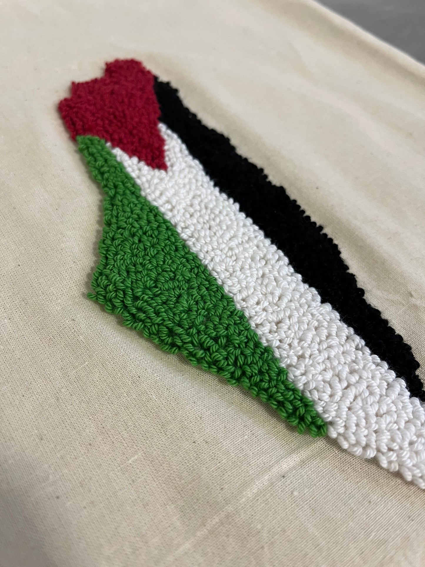 Hand-made punch needle palestine bag